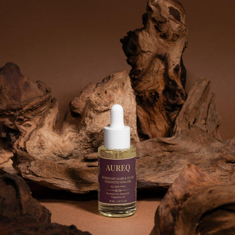 Aureq bottle with dropper on a wooden background