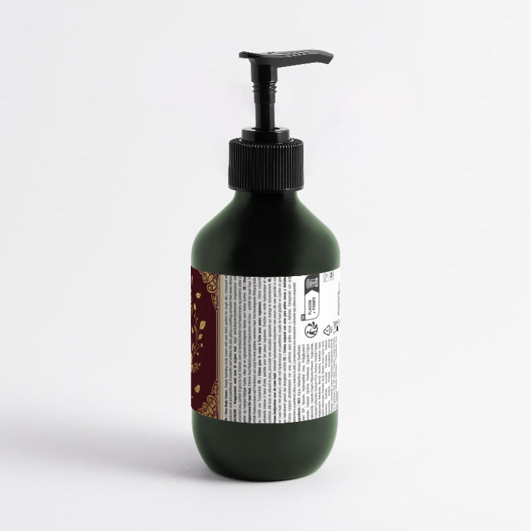 Green bottle with pump and label on a white background