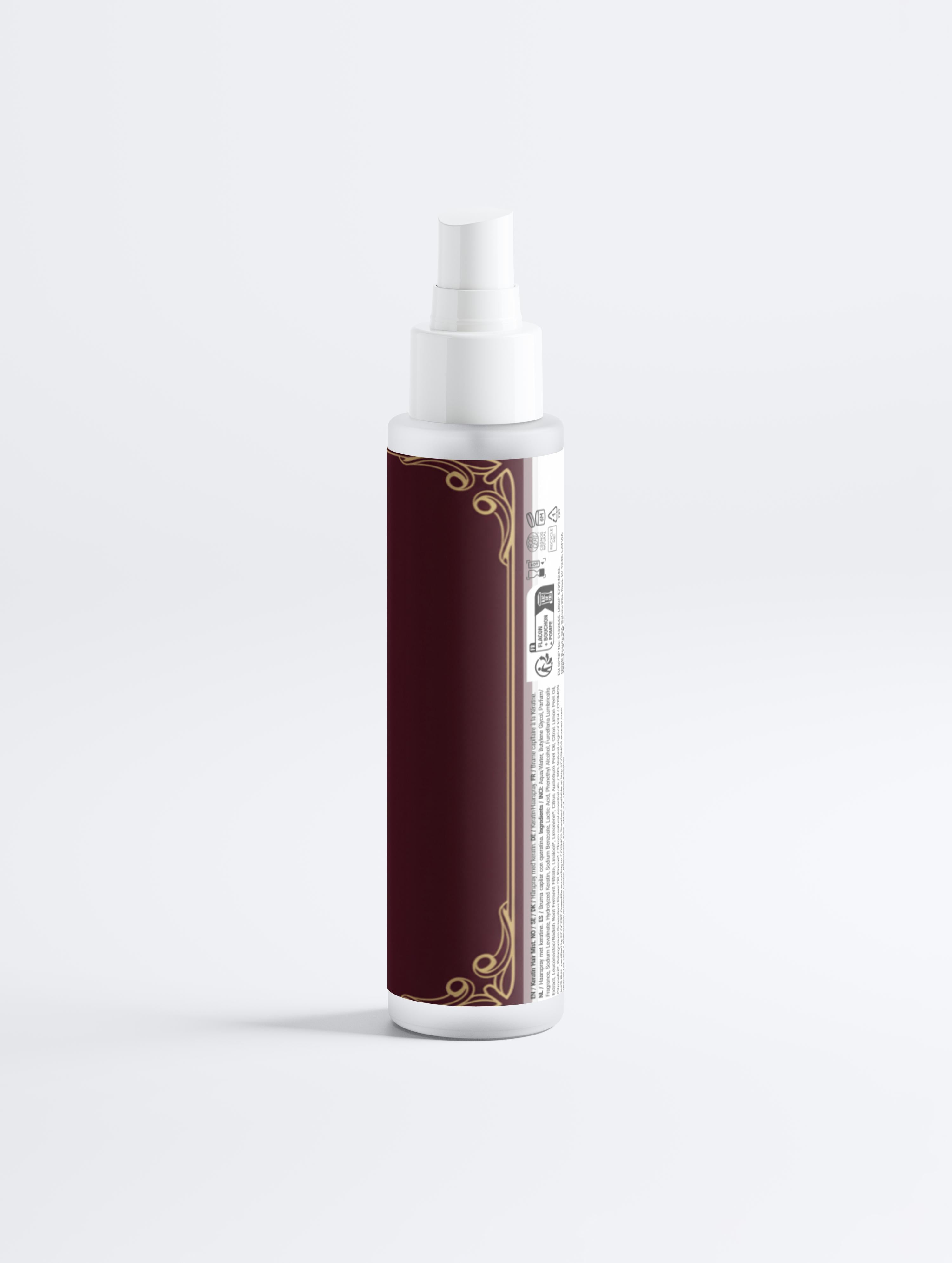 Spray bottle with a maroon label on a white background