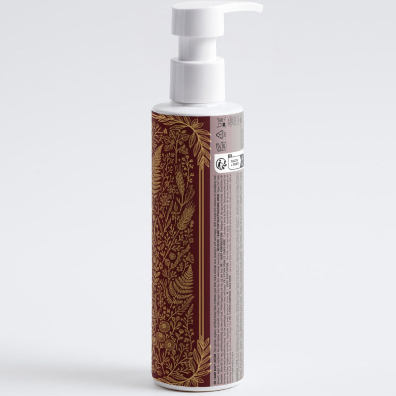 Lotion bottle with decorative label on a white background AUREQ