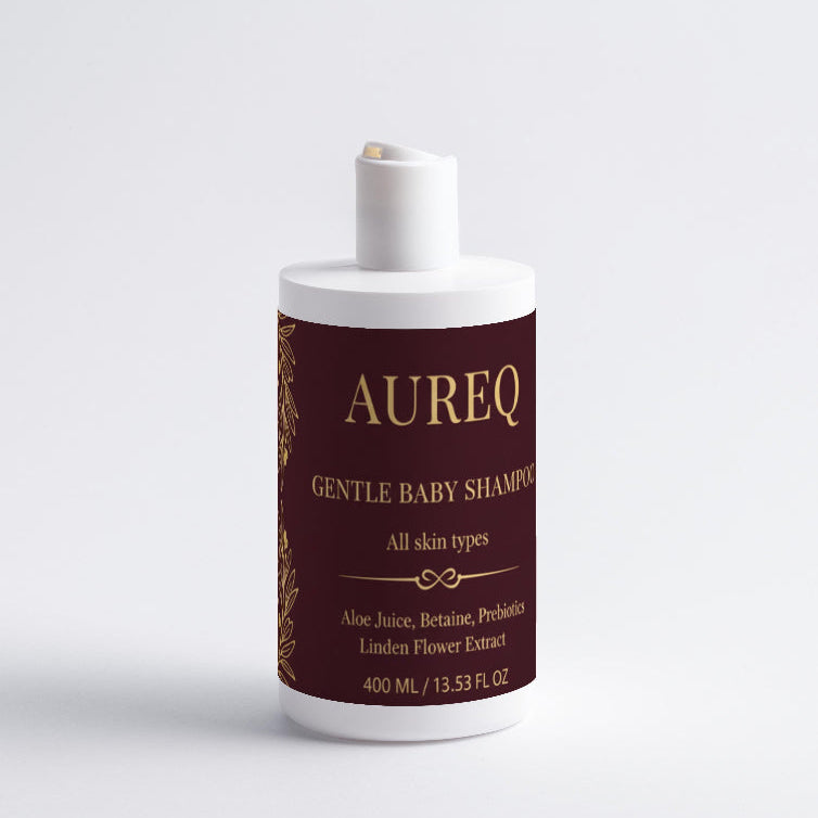Aureq Gentle Baby Shampoo bottle with a white cap on a light gray background