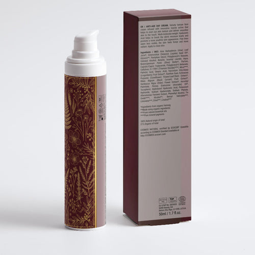 Hair spray can with decorative label and packaging box on a white background